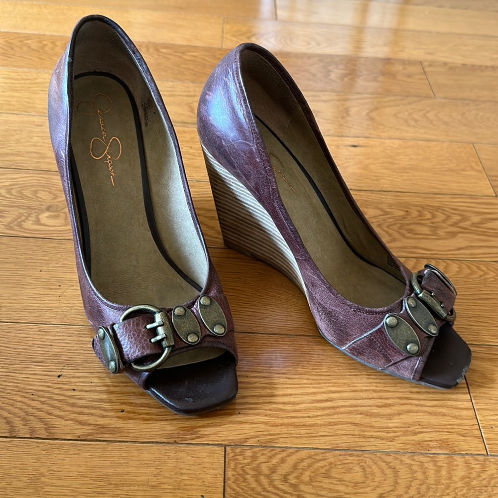 Jessica Simpson open toe leather wedge pumps.